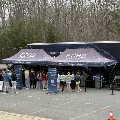 Exploring New Horizons: Students Engage with Air Force Recruiter at School Event